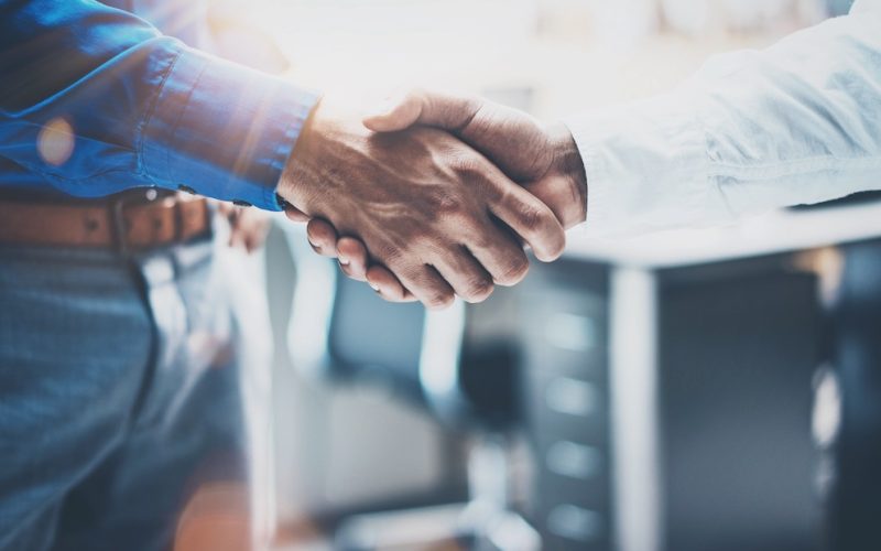 Close up view of business partnership handshake concept.Photo of two businessman handshaking process.Successful deal after great meeting.Horizontal,flare effect, blurred background SSUCv3H4sIAAAAAAAEAH1SO2/DIBDeK/U/WMxxC8bBcccO3Sp1jzJgfElQbIgMTlNF/u8FPxqcRlksf4/7OO64PD9FESq4kQK9RRePHJZV1RrbcCu1cjRejDyU0upG8sqTnut6BRnLbWvABBFm31oLjbFaHBxNA7fgFnYuZuafWlgPOJqEXnQVTkLvrZEKjHn9kIorAWgReExbeM8X6GMFaBK6xYO80Xsn5RPUNWL42UxD4DtQ4ufaup9Xf83jXlsdXsEps3B8Zudl8kKW/1nq2Ync/Mlo6yIryW9SCSbM5WCSZf13da+0bIDXxsoabqozNjs/y+cw6GP46YLdNVABHza9Hs5Ch2+357rf5Wg6yRJ0gHlbSh3s+qQFr8zNqzg2Uki1C8q03UMTYOHepK4DQmnbdzJOGZXuYXlIKEkoY5jlJMGM4hyPBll6eUsBMrqFeEUSHqeUpnGRriAmeVEWyZKlRGRuBt0v4xyp4RwDAAA=